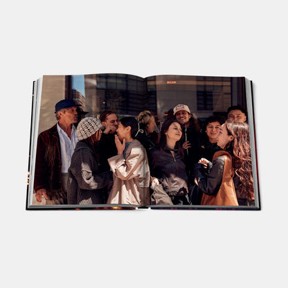 Shop Rescue Spa New York Chic book open to a page featuring a candid street photography portrait of diverse people.