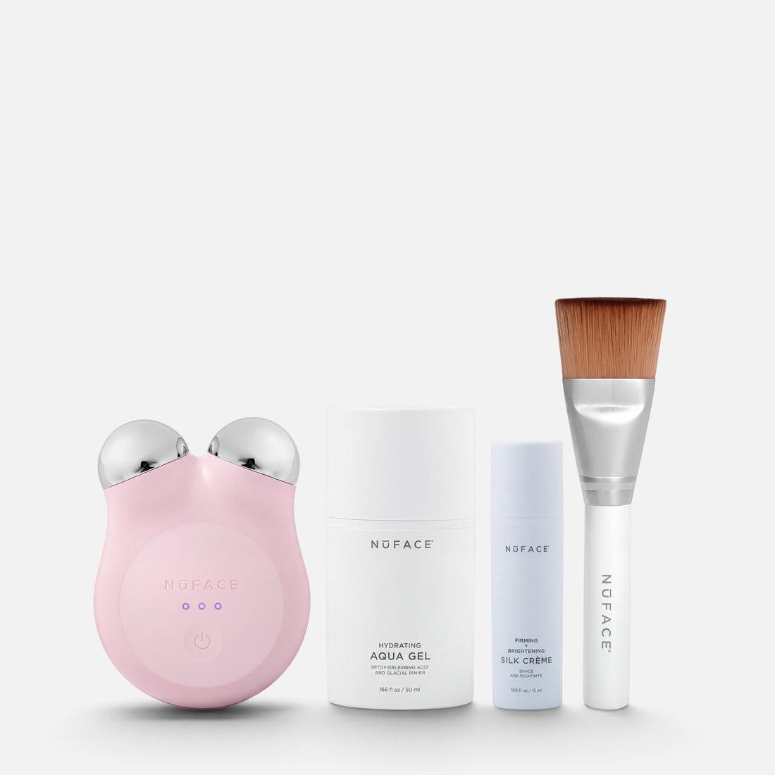 Shop Rescue Spa NuFACE MINI+ starter kit in sandy rose with facial toning device, aqua gel, silk creme, and brush.