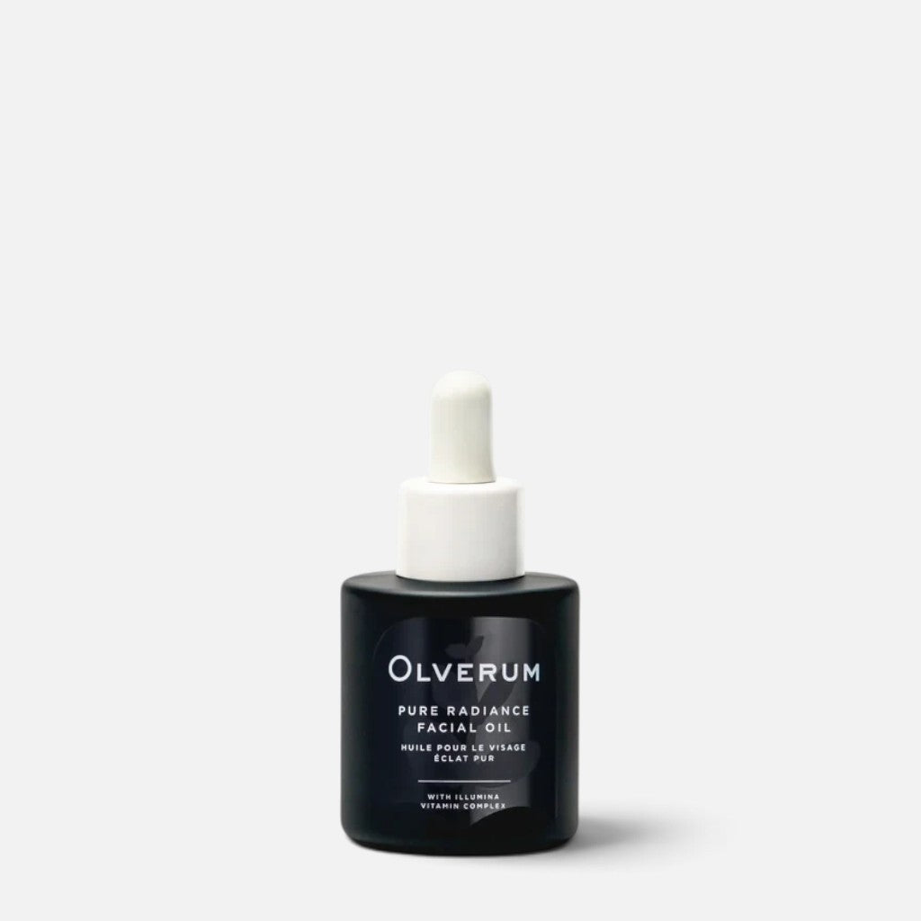 Shop Rescue Spa Olverum Pure Radiance Facial Oil in a black glass bottle with a white dropper cap.