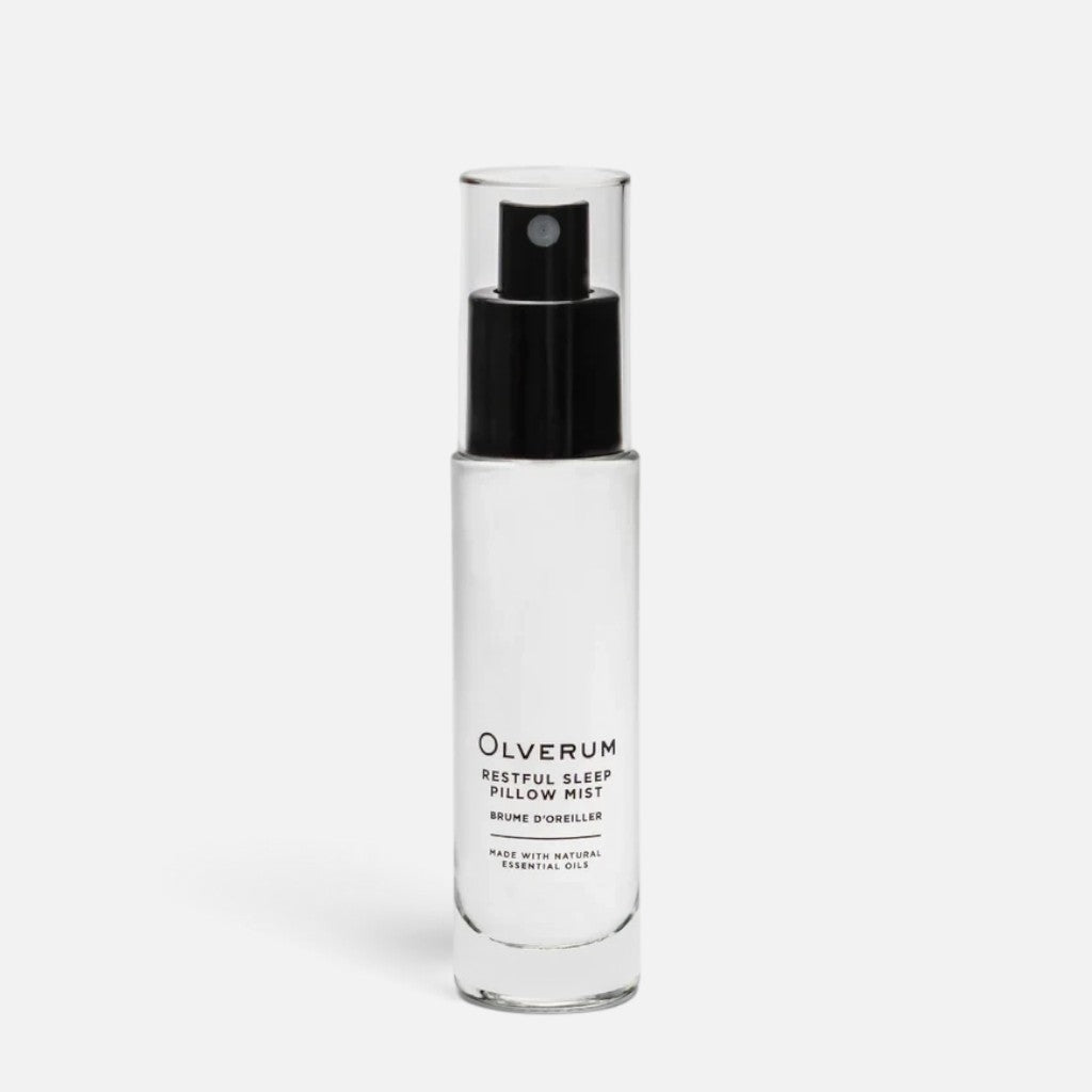 Shop Rescue Spa Olverum Restful Sleep Pillow Mist in a clear 30ml glass spray bottle with a black pump dispenser.