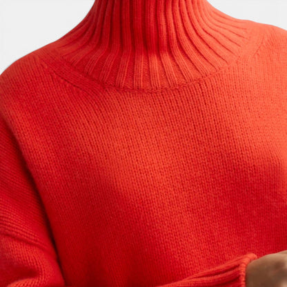 Shop Rescue Spa Girlfriend turtleneck sweater in vibrant orange chunky knit 100% cashmere with ribbed collar