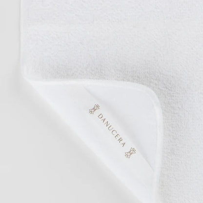 Shop Rescue Spa white organic cotton dual-sided washcloth with terry and muslin textures for double cleansing.