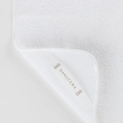 Shop Rescue Spa white organic cotton dual-sided washcloth with terry and muslin textures for double cleansing.