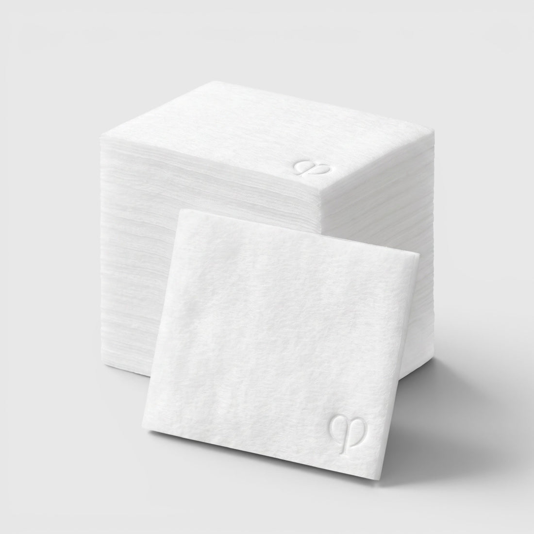 Shop Rescue Spa organic cotton facial pads with embossed logo, 120 count stack for skincare application