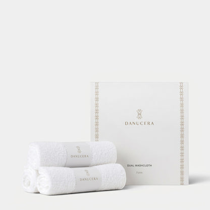 Shop Rescue Spa organic cotton dual washcloth set with white terry and muslin textures in branded packaging.