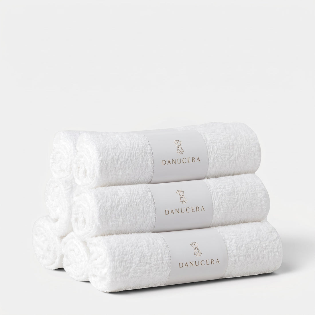 Shop Rescue Spa organic cotton dual washcloths stacked in a white roll with Danucera branding