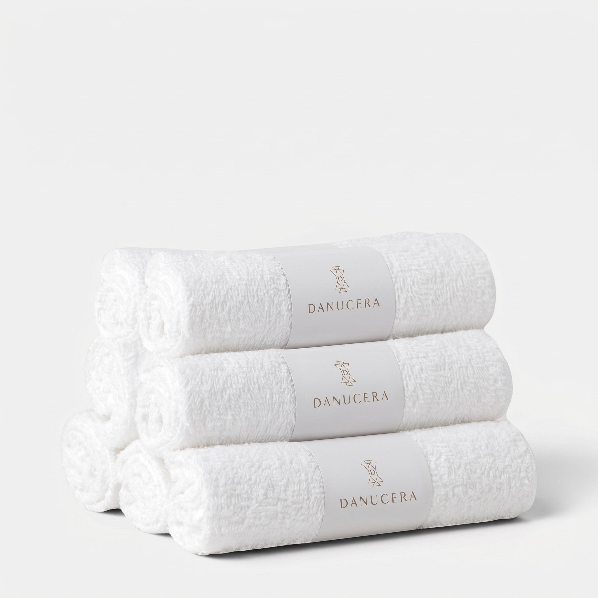 Shop Rescue Spa organic cotton dual washcloths stacked in a white roll with Danucera branding