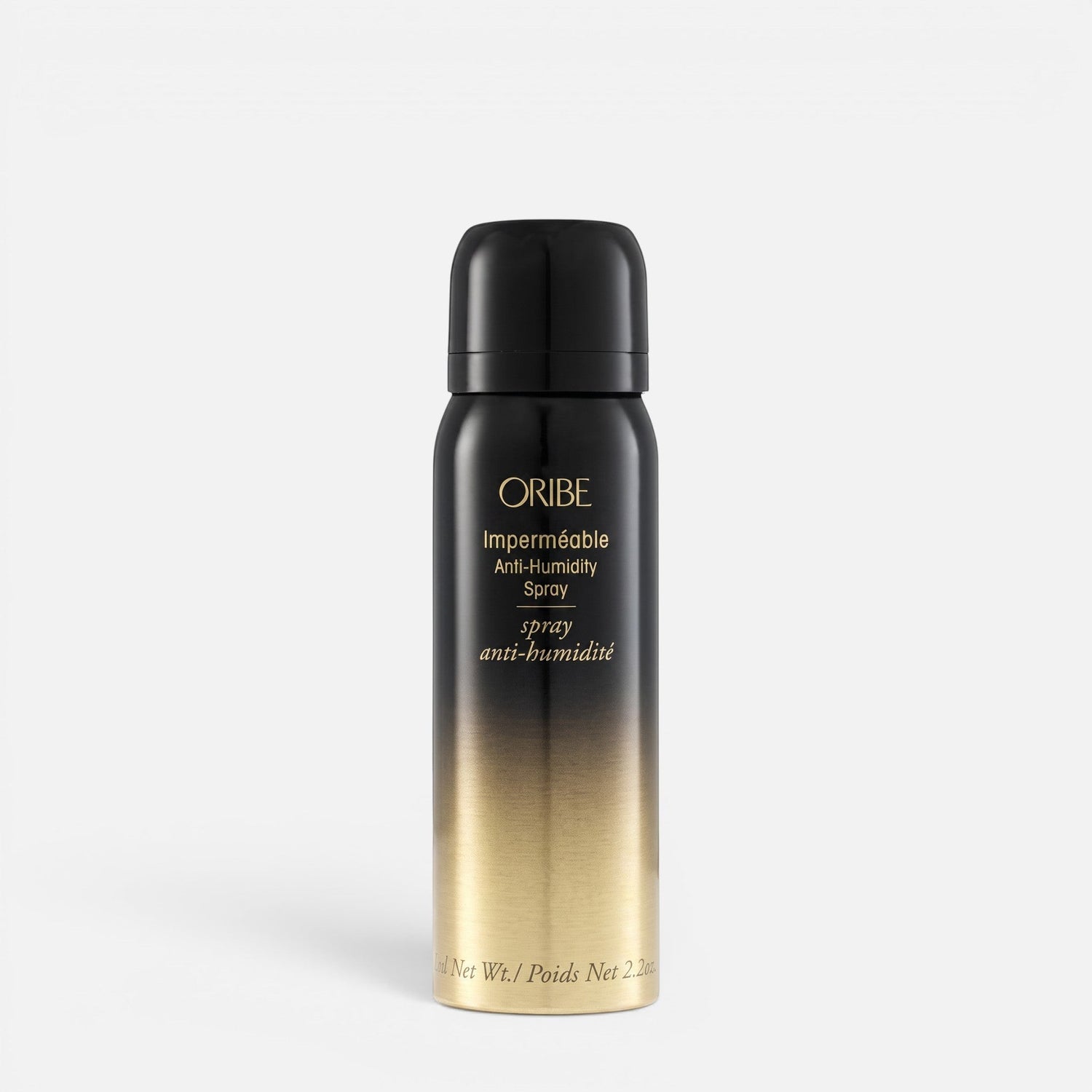 Shop Rescue Spa Oribe Impermeable Anti-Humidity hair spray in a black and gold travel-sized aerosol bottle.
