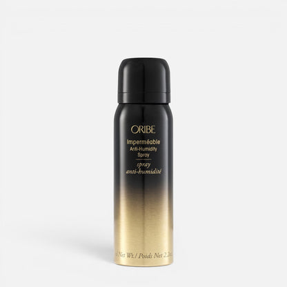 Shop Rescue Spa Oribe Impermeable Anti-Humidity hair spray in a black and gold travel-sized aerosol bottle.