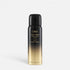 Shop Rescue Spa Oribe Impermeable Anti-Humidity hair spray in a black and gold travel-sized aerosol bottle.