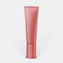 Shop Rescue Spa Oribe Bright Blonde Sun Lightening Mist in a pink squeeze tube for illuminating hair highlights.