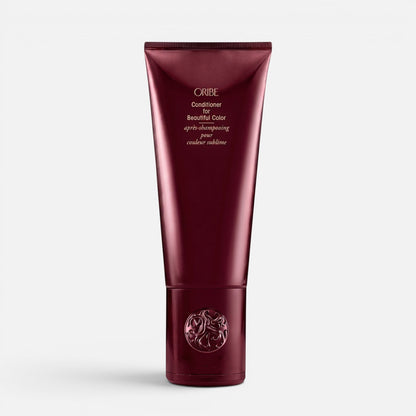 Shop Rescue Spa Oribe Conditioner for Beautiful Color in a deep burgundy squeeze tube for color-treated hair.