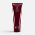 Shop Rescue Spa Oribe Conditioner for Beautiful Color in a deep burgundy squeeze tube for color-treated hair.