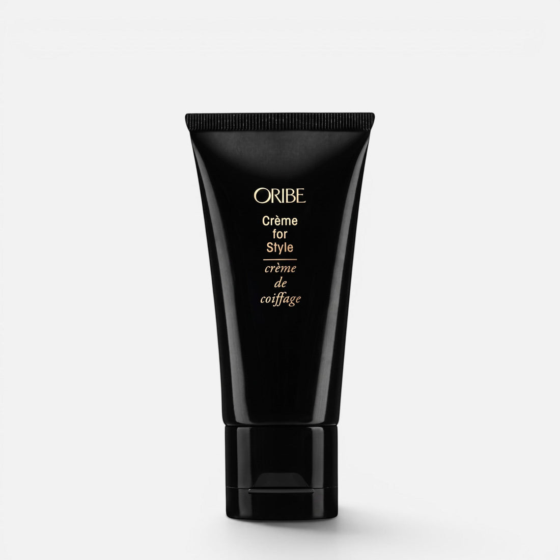 Shop Rescue Spa Oribe Creme for Style hair cream in a black squeeze tube for firm hold and shine.