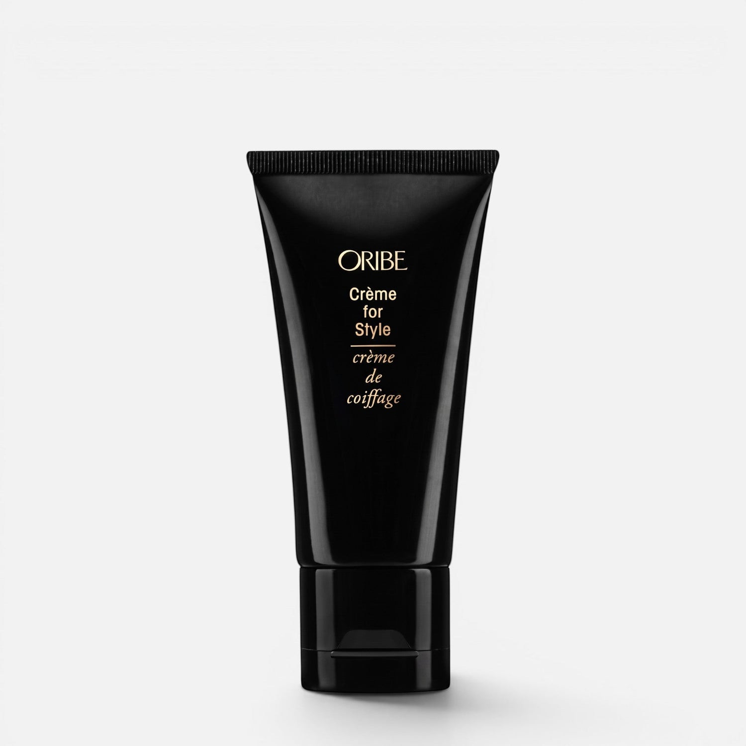 Shop Rescue Spa Oribe Creme for Style hair cream in a black squeeze tube for firm hold and shine.