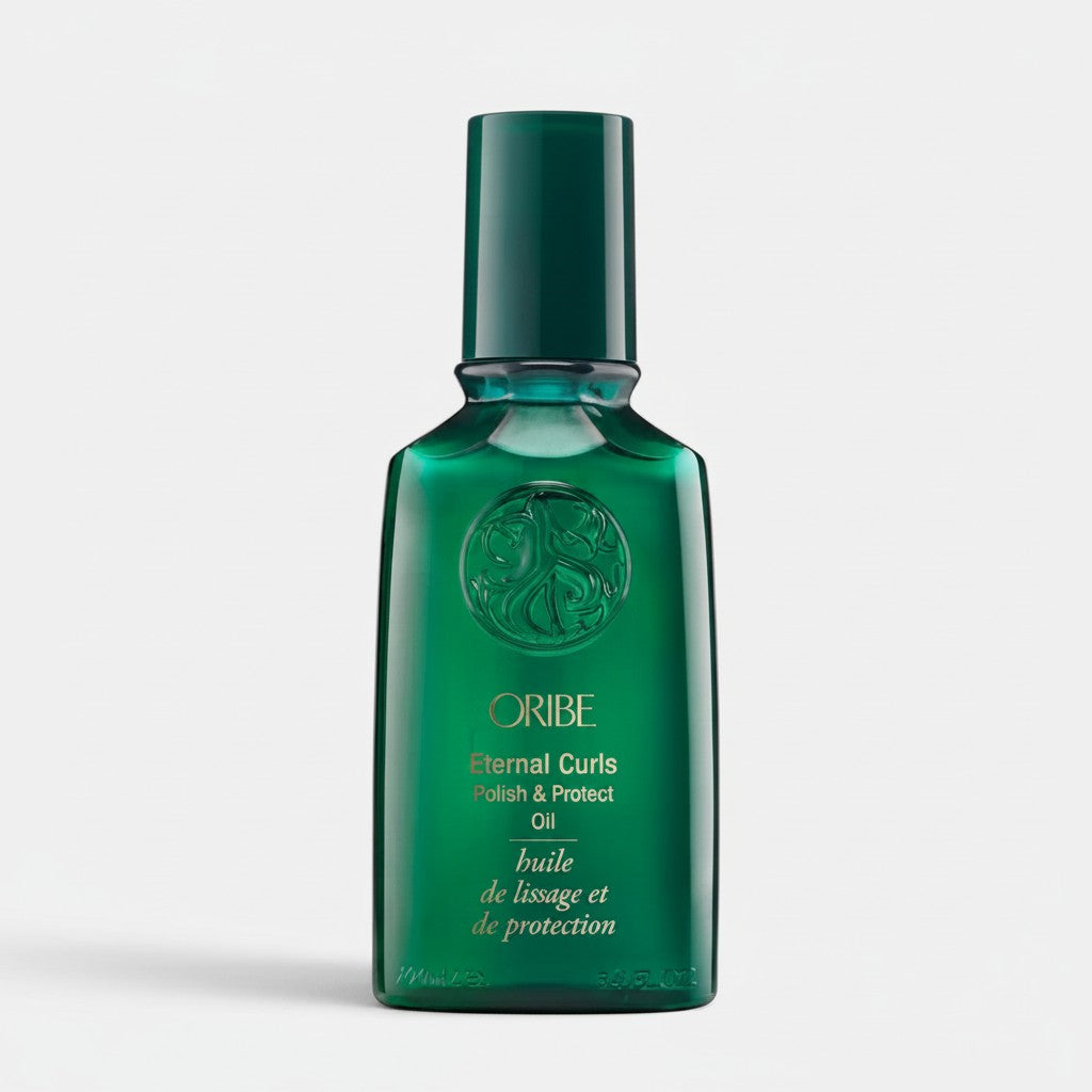 Shop Rescue Spa Oribe Eternal Curls Polish &amp; Protect Oil in a dark green glass bottle for curly hair care.