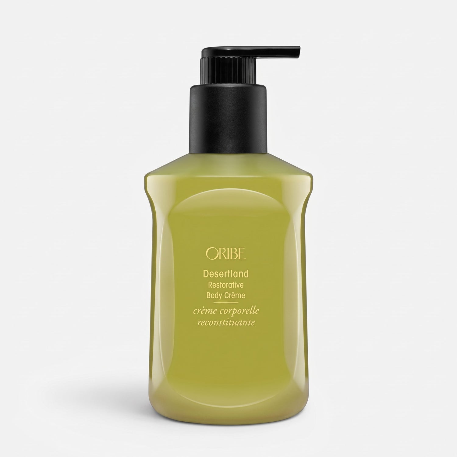Shop Rescue Spa Oribe Desertland Restorative Body Creme in a 300ml olive green pump bottle for hydrating skin.
