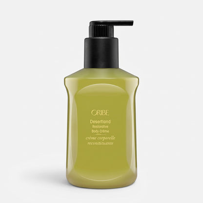 Shop Rescue Spa Oribe Desertland Restorative Body Creme in a 300ml olive green pump bottle for hydrating skin.