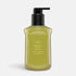 Shop Rescue Spa Oribe Desertland Restorative Body Creme in a 300ml olive green pump bottle for hydrating skin.