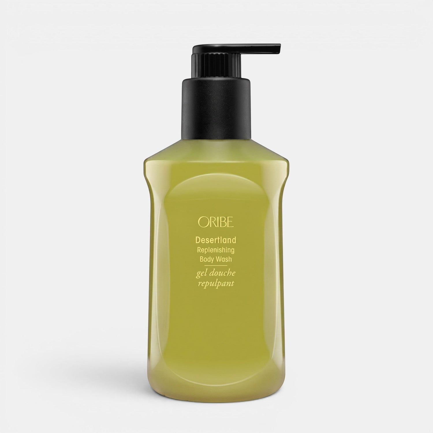 Shop Rescue Spa Oribe Desertland Replenishing Body Wash in a green bottle with a black pump dispenser.