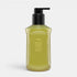 Shop Rescue Spa Oribe Desertland Replenishing Body Wash in a green bottle with a black pump dispenser.