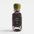 Shop Rescue Spa Oribe Desertland eau de parfum in a clear glass bottle with a matte olive green cap.