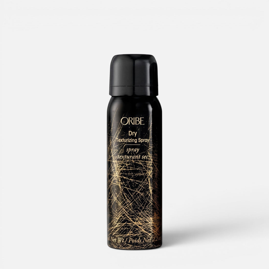 Shop Rescue Spa Oribe Dry Texturizing Spray in a black bottle with gold graphic details for hair volume and texture.