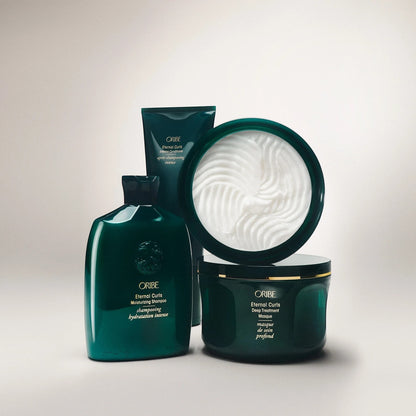 Shop Rescue Spa ORIBE Eternal Curls Moisturizing Shampoo and Deep Treatment Masque in dark green bottles.