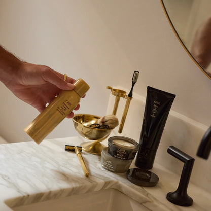 Shop Rescue Spa Oribe Flash Form Finishing Spray Wax for buildable texture and shine. Gold can.