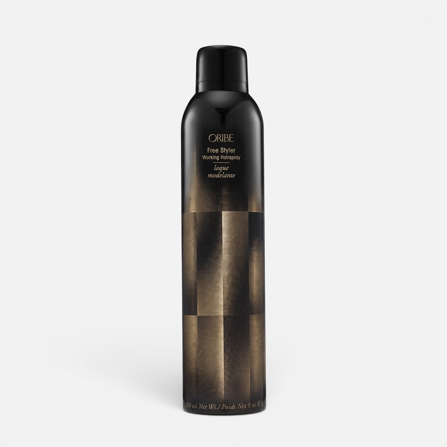 Shop Rescue Spa Oribe Free Styler Working Hair Spray in a black and gold 300ml aerosol bottle for light hold styling.