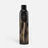 Shop Rescue Spa Oribe Free Styler Working Hair Spray in a black and gold 300ml aerosol bottle for light hold styling.
