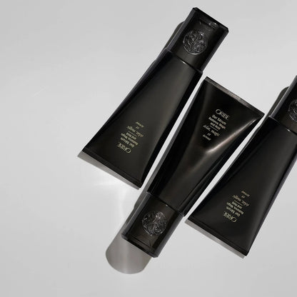 Shop Rescue Spa Oribe Gel Serum with gold flecks for flexible hold and moisture. Black tubes.