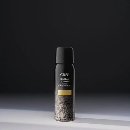 Shop Rescue Spa Oribe Gold Lust Dry Shampoo in a black and gold aerosol bottle for hair cleansing and oil absorption.