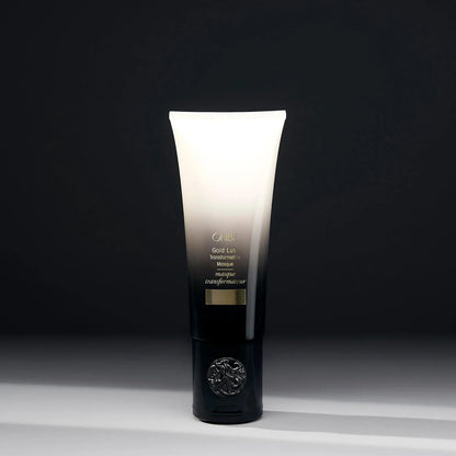 Shop Rescue Spa Oribe Gold Lust Transformative Mask in a sleek black and white gradient tube for hair repair.