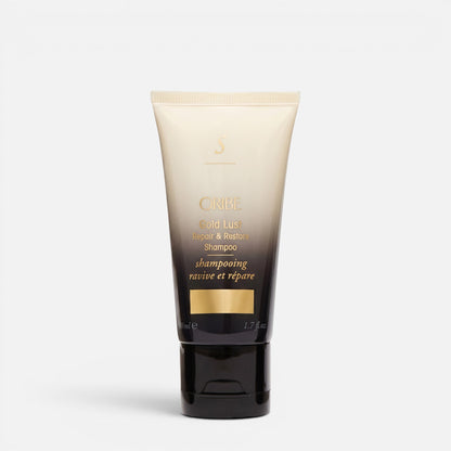Shop Rescue Spa Oribe Gold Lust Repair &amp; Restore Shampoo in a sleek black and cream travel-sized squeeze tube.