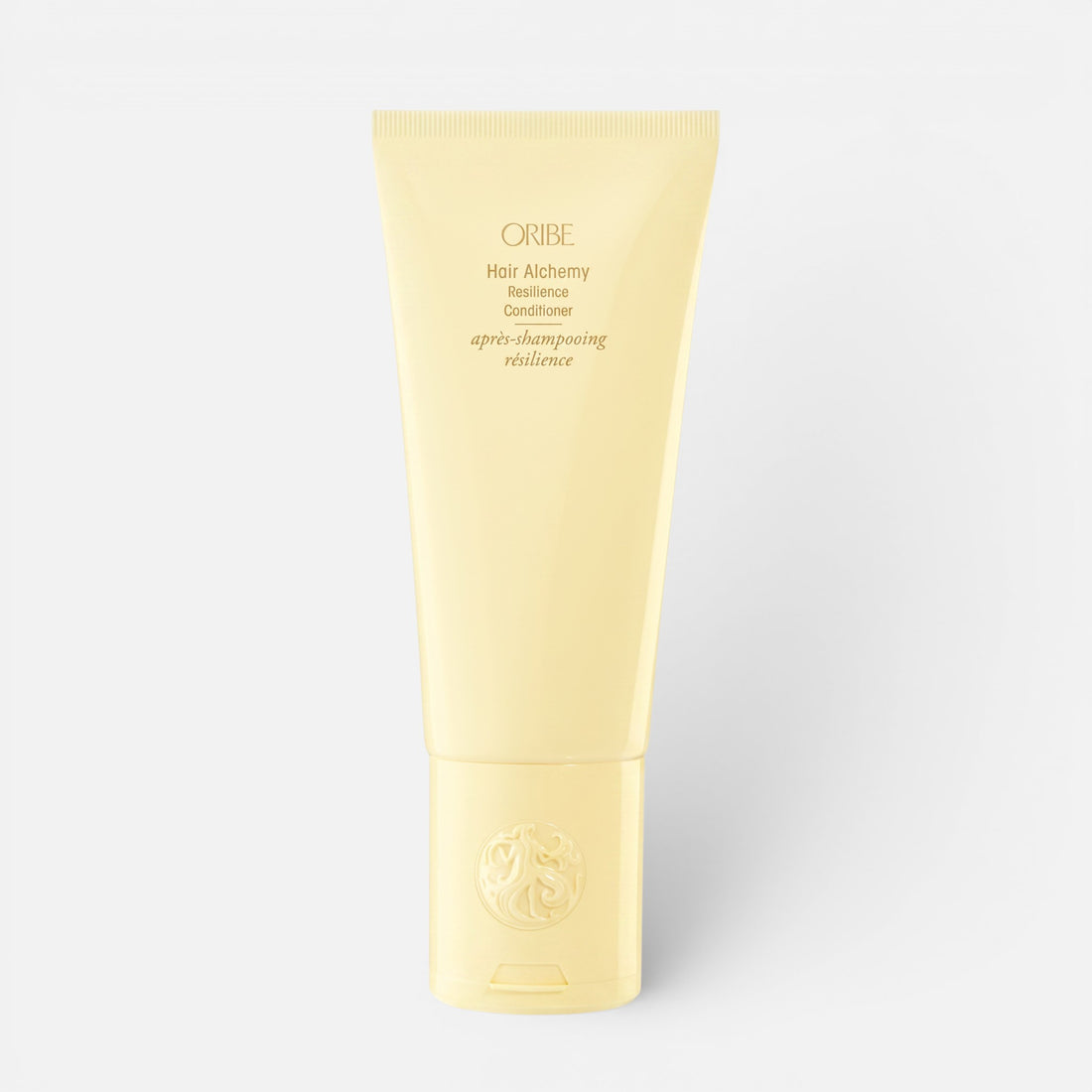 Shop Rescue Spa Oribe Hair Alchemy Resilience Conditioner in a pale yellow squeeze tube for strengthening hair