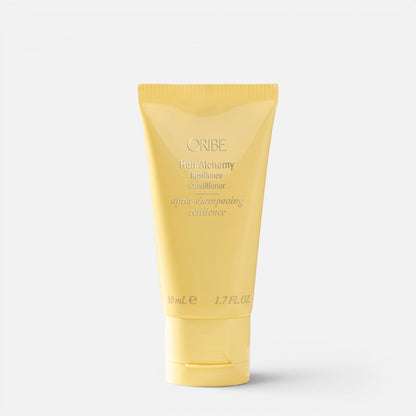 Shop Rescue Spa Oribe Hair Alchemy Resilience Conditioner in a 50ml yellow travel-size squeeze tube.