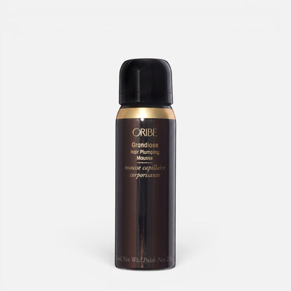 Shop Rescue Spa Oribe Grandiose Hair Plumping Mousse in a dark brown bottle for added volume and thickness