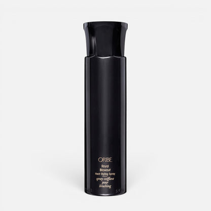 Shop Rescue Spa Oribe Royal Blowout Heat Styling Spray in a sleek black bottle for smooth, heat-protected hair.