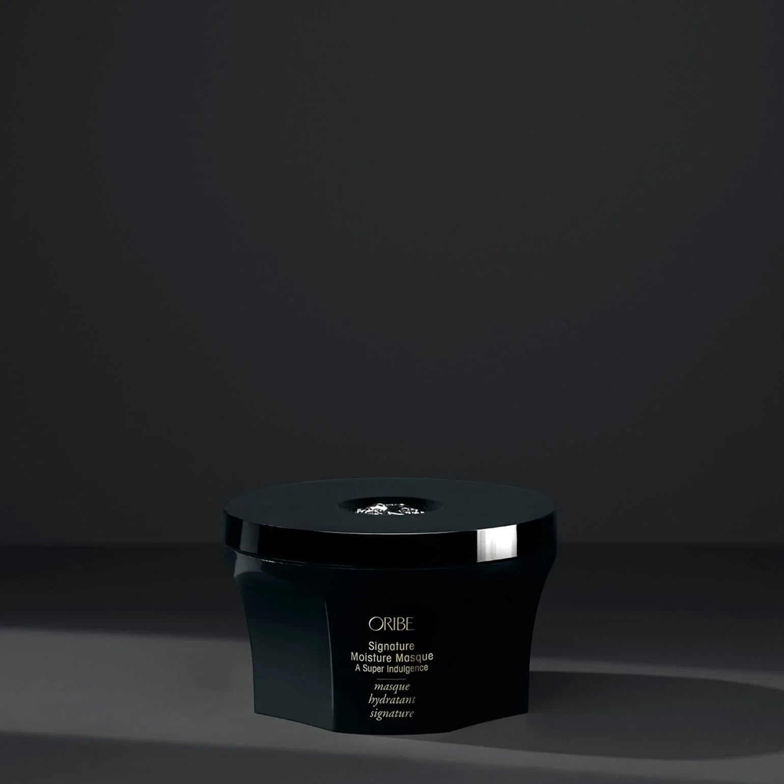 Shop Rescue Spa Oribe Signature Moisture Masque in a black jar for deep hair hydration and repair.
