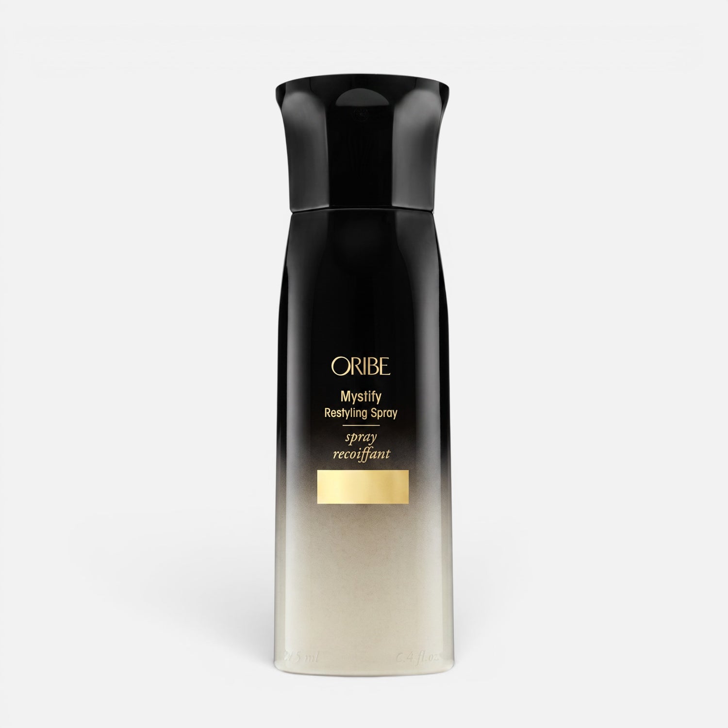 Shop Rescue Spa Oribe Mystify Restyling Spray bottle with black and gold gradient packaging for heat protection.
