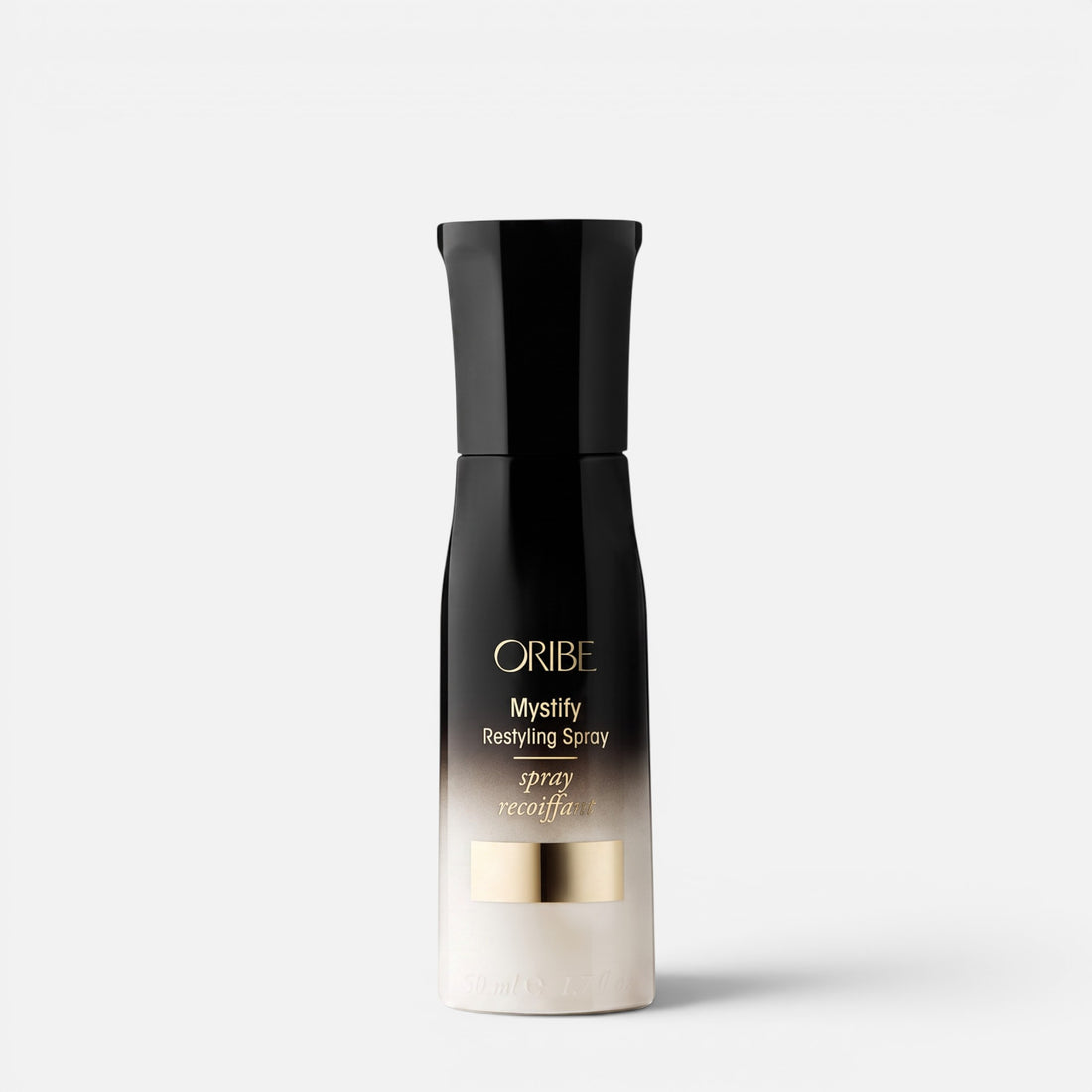 Shop Rescue Spa Oribe Mystify Restyling Spray bottle with black and gold gradient packaging for heat protection.