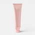 Shop Rescue Spa Oribe Serene Scalp Exfoliating Scrub in a pale pink 125ml squeeze tube for scalp purification.
