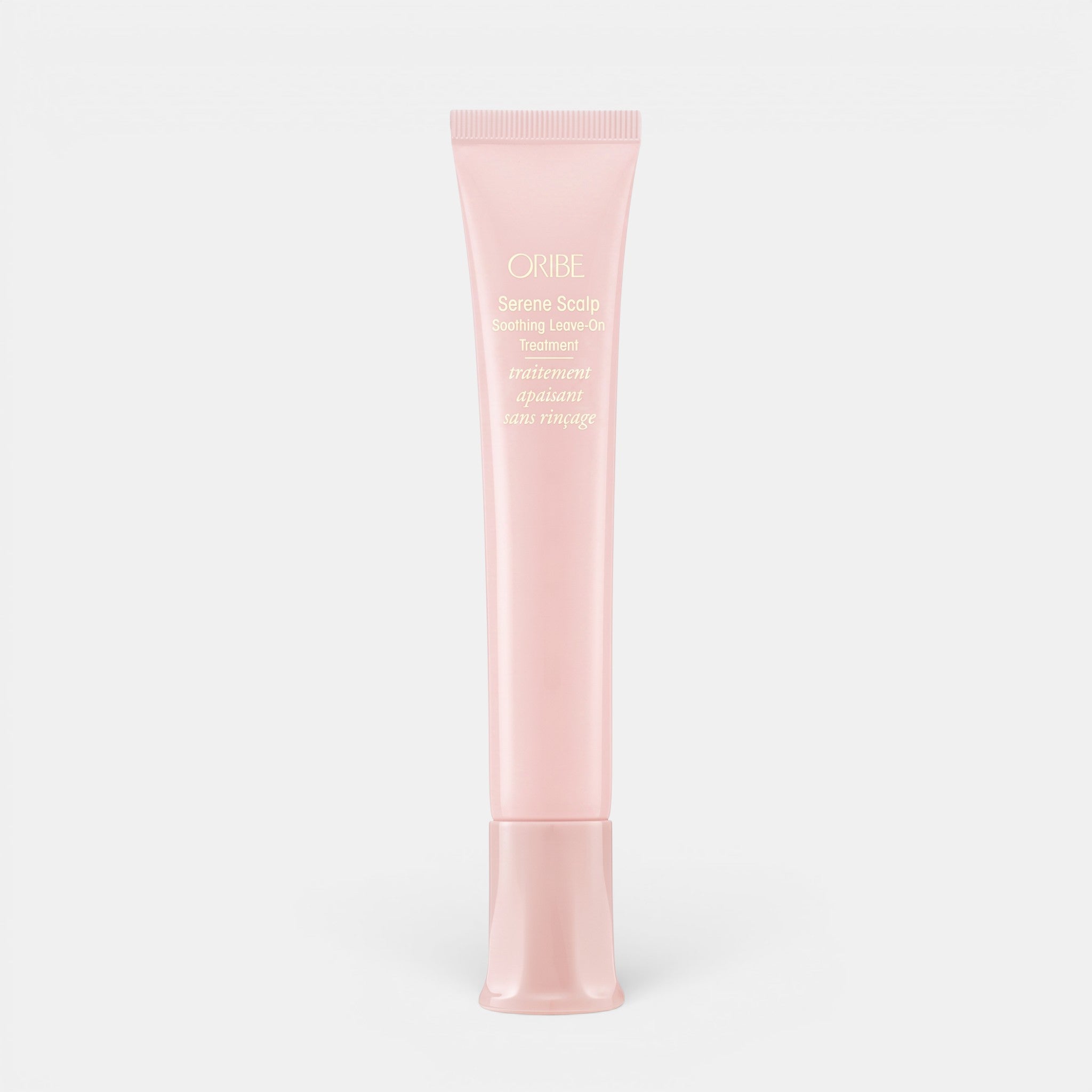 Shop Rescue Spa Oribe Serene Scalp Soothing Leave-On Treatment in a pale pink squeeze tube for scalp care.