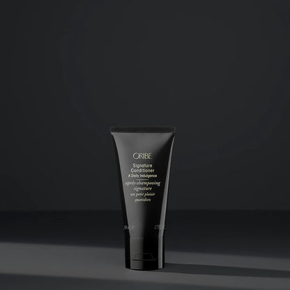 Shop Rescue Spa Oribe Signature Conditioner in a sleek black 50ml travel-size tube for daily hair moisturizing.