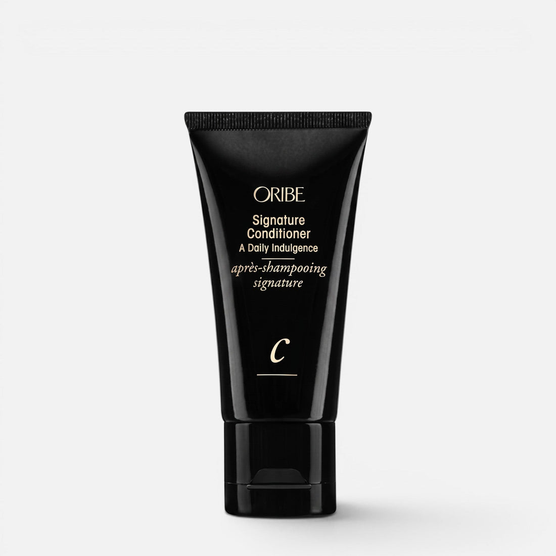 Shop Rescue Spa Oribe Signature Conditioner in a sleek black squeeze tube for daily hair moisturizing and repair.
