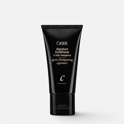 Shop Rescue Spa Oribe Signature Conditioner in a sleek black squeeze tube for daily hair moisturizing and repair.