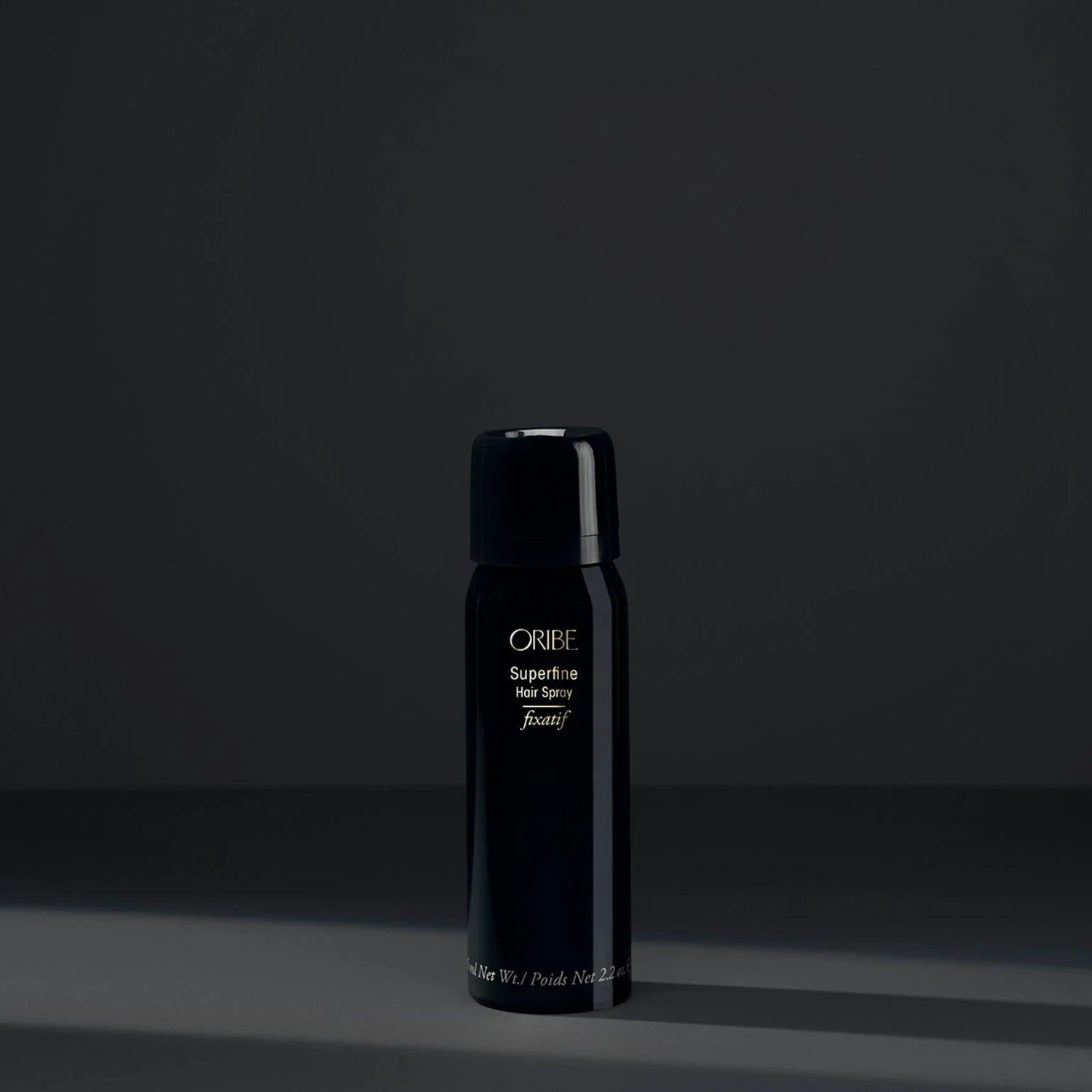 Shop Rescue Spa Oribe Superfine Hair Spray travel size bottle in black packaging with white text