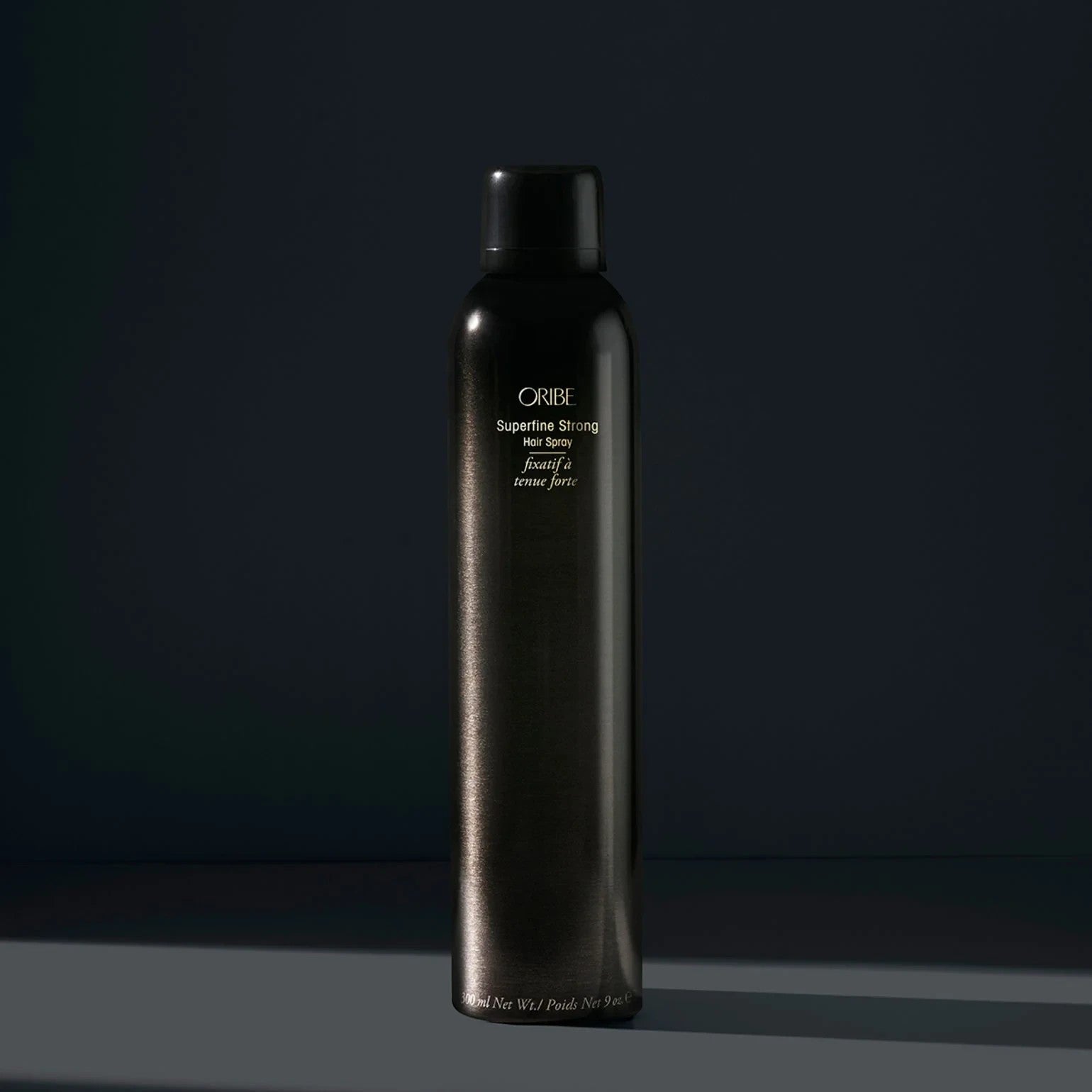 Shop Rescue Spa Oribe Superfine Strong Hair Spray, 9 oz, provides strong hold and natural shine.