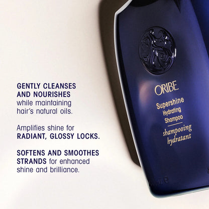Shop Rescue Spa Oribe Supershine Hydrating Shampoo bottle, dark blue with gold lettering, for glossy, hydrated hair.